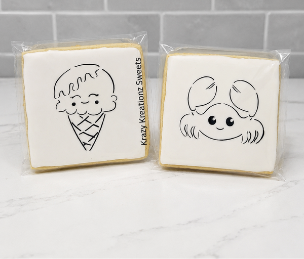 Two square sugar cookies in clear plastic wrapping, decorated with simple black line drawings of a cartoon ice cream cone and a cartoon dog, on a white marble surface with a gray subway tile background.
